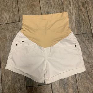 A. Glow white denim maternity shorts. Like new!